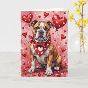 Amerikanischer Bulldog-Valentinstag-Hund sitzt mit Karte