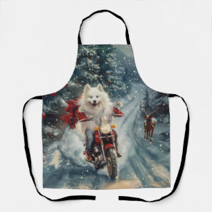 Amerikanischer Eskimo-Hund fährt Motorrad Weihnach Schürze