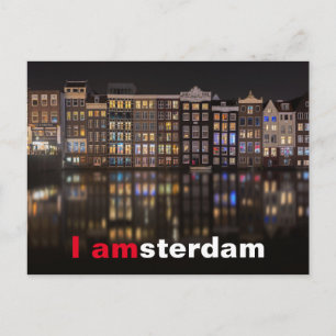 Amsterdam-Häuser mit bunten Lichtern in der Nacht Postkarte