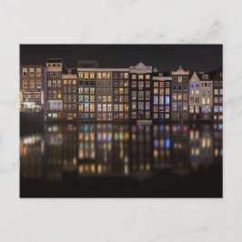Amsterdam-Häuser mit bunten Lichtern in der Nacht Postkarte