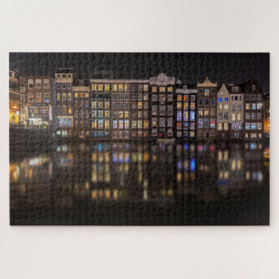 Amsterdam-Häuser mit bunten Lichtern in der Nacht Puzzle