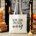 An manchen Tagen bin ich extrem witzige, moderne F Tragetasche<br><div class="desc">Fügen Sie Ihrem Stil eine Touch Sass hinzu mit unserer "Einige Tage ich bin extra witchy" Moderne FrauenkHalloween-Tasche! Diese schicke, schwarze Tasche zeichnet sich durch den spielerischen Satz in eleganter, moderner Typografie aus, der sich perfekt für die Ausdrucksform Ihrer Hexe eignet. Aus langlebigen Materialien gefertigt, ist es geräumig genug für...</div>