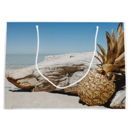 Ananas aus Gold am Strand Große Geschenktüte