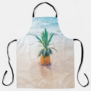 Ananas-Früchte am Strand am Morgen Schürze