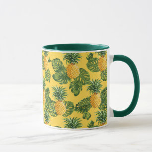 Ananas und tropische Blätter auf Gold Tasse