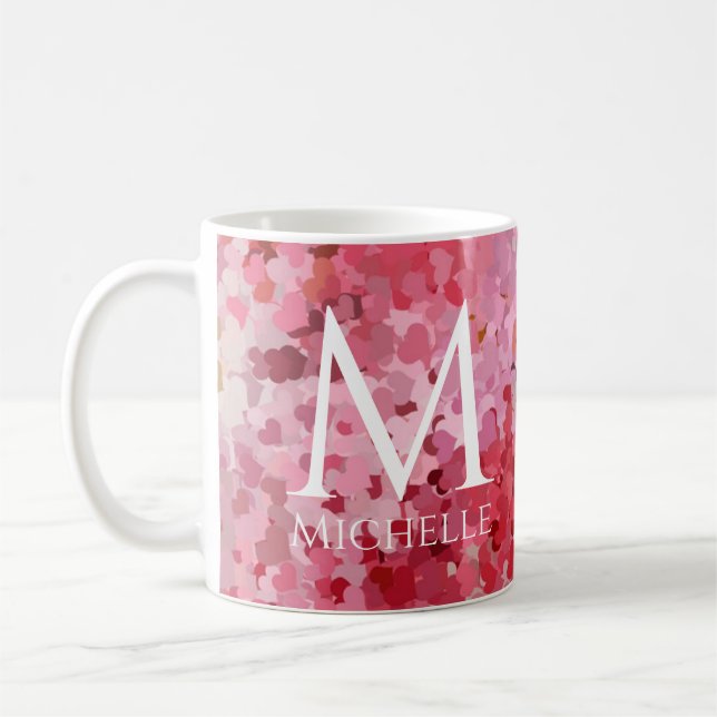 Anfängliches rosafarbenes Vorlagenmonogramm Kaffeetasse (Links)