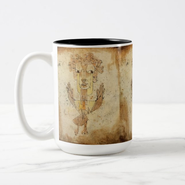 Angelus Novus von Paul Klee Zweifarbige Tasse (Links)
