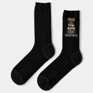 Angetrieben von Männern in grauen Sweathosen Socken