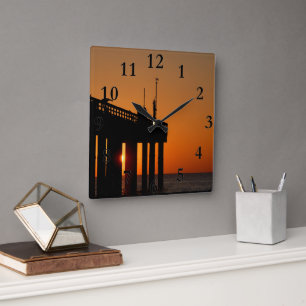 Angler bei Sonnenaufgang Quadratische Wanduhr