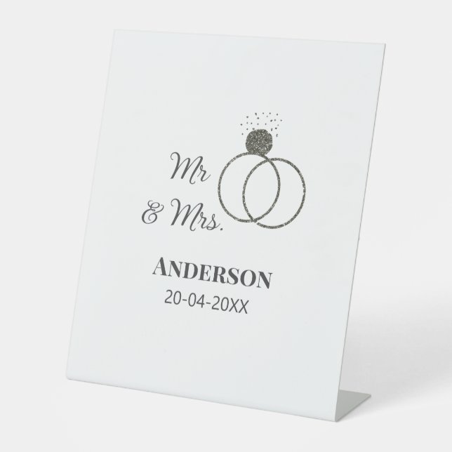 Anm & Frau geben Sie den Familiennamen Datum Jahr  Sockelschild (Vorderseite)