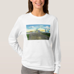 Ansicht von Brainard Feld, landende Flugzeuge u. T-Shirt