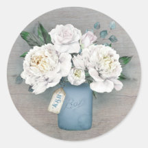 Anstrichene blaue Mason Jar und weiße Blume