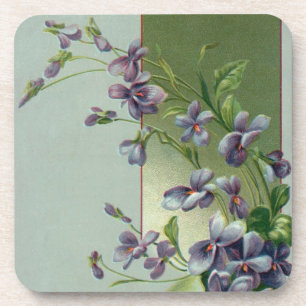 Antike blühende violette Blumen in einem Osterei Untersetzer