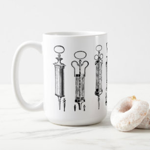 Antike medizinische Spritzen von 1929 Kaffeetasse