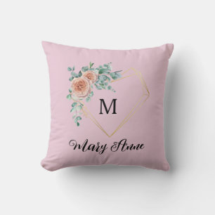 Antike rosa Rosen mit goldenem Herz-Monogramm und Kissen