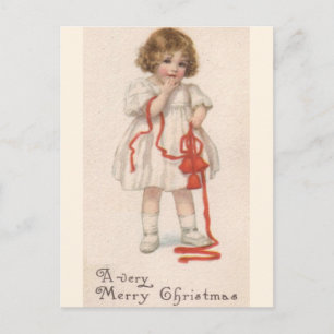 Antikes kleines Mädchen mit Weihnachtsband Feiertagspostkarte