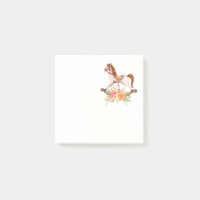 Antikes Schaukelpferd mit Blumenbouquet