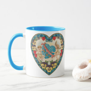 Antikes Valentinstag, Vintage-Engel in einem Herze Tasse
