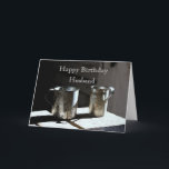 Antique Tin Cups Husband Happy Birthday Karte<br><div class="desc">Ein Paar antiker Zinnbecher sitzen auf den groben Planken eines alten Tisches in den Kasernen einer Festung aus dem frühen 19. Jahrhundert in Missouri. Dieses Foto wird in Aquarellfarben dargestellt.  Der Text auf der Vorderseite und innen kann geändert oder gelöscht werden.</div>