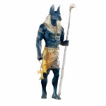 Anubis Ägypter-Gott Fotoskulptur Ornament<br><div class="desc">Anubis war ein Begräbnisgott. Seine Aufgabe kam,  die Skalen zu halten,  auf denen das Herz gewogen wurde. Wenn das Herz heller als eine Feder war,  würden die Toten durch Anubis zu Osiris geführt. Wenn schwer,  würde das Soul zerstört.</div>