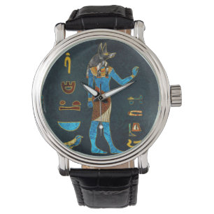Anubis ägyptisches Gold-, Blaues und Rotesglas Armbanduhr