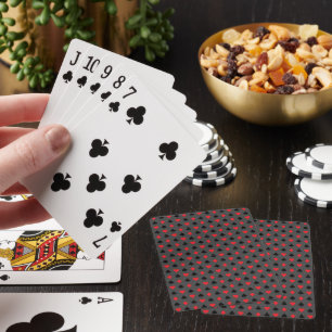 Anzüge mit roter schwarzer Karte auf grauen Spielk Spielkarten