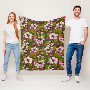 Apfelblüte auf dunkelgrün fleecedecke