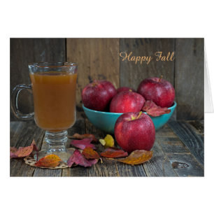 Apfelwein und rote Äpfel