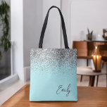 Aqua Blue Aquamarin Silver Glitzer Monogram<br><div class="desc">Aqua Blue Aquamarin Silver Glitzer Monogram Book Bag. Diese Büchertasche kann auf Ihren Vor- und Vornamen angepasst werden und als Geschenk für Weihnachten,  Geburtstag,  Brautparty oder Hochzeit.</div>