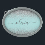 Aqua Blue Aquamarin Silver Glitzer Monogram Ovale Gürtelschnalle<br><div class="desc">Aqua Blue - Aquamarine und Silver Sparkle Glitzer Script Monogram Name Gelt Buckle. Das macht den perfekten Abschluss,  süß 16 16.,  18.,  21.,  30.,  40.,  50.,  60.,  70.,  80.,  90.,  100. Geburtstag,  Hochzeit,  Brautparty,  Jubiläum,  Babydusche oder Junggeselinnen-Abschied Geschenk für jemanden,  der Luxus und Chic Stil Lieben glänze.</div>