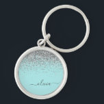 Aqua Blue Aquamarin Silver Glitzer Monogram Schlüsselanhänger<br><div class="desc">Aqua Blue - Aquamarine und Silver Sparkle Glitzer Script Monogram Name Keychains (Key Chain). Das macht den perfekten 16 Geburtstag,  Hochzeit,  Brautparty,  Jubiläum,  Babydusche oder Junggeselinnen-Abschied Geschenk für jemanden,  der Lieben glamourösen Luxus und schicke Stile.</div>