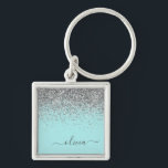 Aqua Blue Aquamarin Silver Glitzer Monogram Schlüsselanhänger<br><div class="desc">Aqua Blue - Aquamarine und Silver Sparkle Glitzer Script Monogram Name Keychains (Key Chain). Das macht den perfekten 16 Geburtstag,  Hochzeit,  Brautparty,  Jubiläum,  Babydusche oder Junggeselinnen-Abschied Geschenk für jemanden,  der Lieben glamourösen Luxus und schicke Stile.</div>