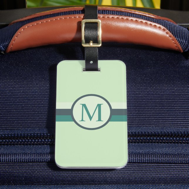 Aquamariner, heller, blauer Farbblock mit  hellwei Gepäckanhänger (Vorderseite Insitu 2)