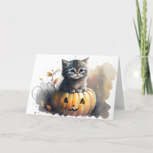 Aquarell-Halloween-Kätzchen in einem Kürbis Feiertagskarte