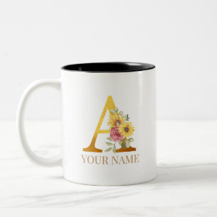 Aquarellblüten und Goldbuchstaben Ein Monogramm Zw Zweifarbige Tasse