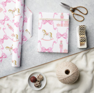 Aquarellfarben, rosa Nutcracker und Bogen Geschenkpapier