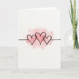 Aquarellkarte mit drei verbundenen Herzen Karte
