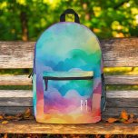 Aquarellpastellfarben Rainbow Clouds Monogram Bedruckter Rucksack<br><div class="desc">Brillen Sie den Tag Ihres Kindes mit dem farbenfrohen, pastellfarbenen Regenbogenwolken-Monogram-bedruckten Rucksack. Dieser bezaubernde Rucksack ist mit einem wunderschönen, pastellfarbenen Regenbogendesign mit flauschigen Wolken ausgestattet, das mit dem Monogramm Ihres Kindes für eine persönliche Touch angepasst werden kann. Es ist aus langlebigen Materialien gefertigt und verfügt über geräumige Fächer und robuste...</div>