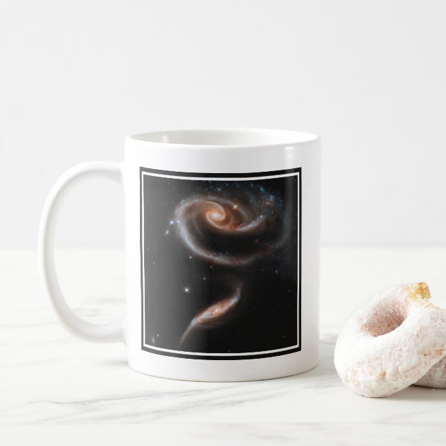 Arp 273 Interaktive Galaxien in Andromeda. Kaffeetasse (Mit Donut)