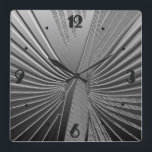 Art Deco Chrom Palmenblatt Quadratische Wanduhr<br><div class="desc">Art-Deco-Motive basierend auf einem stilisierten Palmenblatt,  in einem 3-D-Effekt in silberfarbener Farbe dargestellt</div>