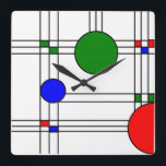 Art Deco  Quadratische Wanduhr<br><div class="desc">Diese Wanduhr hat einen kunstvollen Deko aus Buntglasfenstern mit schwarzen Linien,  roten,  blauen und grünen Quadraten und Kreisen.</div>