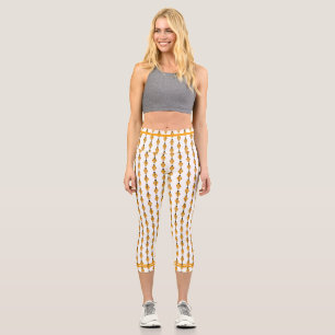 Art Deko Element in hellorangen Capri Leggings