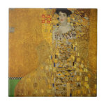 Art Lady goldenes farbiges Kleid | Gustav Klimt Fliese<br><div class="desc">Inspiriert von Gustav Klimts ikonischem Kunstwerk, präsentiert diese Keramik-Kachel ein Design, das eine Kunstfrau in einem goldfarbenen Kleid zeigt, das Eleganz und Reiz ausstrahlt. Diese Art Lady Gold Keramik Fliese ist perfekt für Kunstliebhaber, Fashion-Forward-Individuen und diejenigen, die eine einzigartige und stilvolle Wohngestaltung schätzen. Sie verbindet Kunst und zeitgenössisches Design nahtlos...</div>