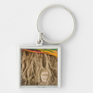 Asien, Thailand, Siam, Buddha in Baumspuren bei Schlüsselanhänger