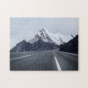 Asphaltstraße vor Schnee-Berg Puzzle