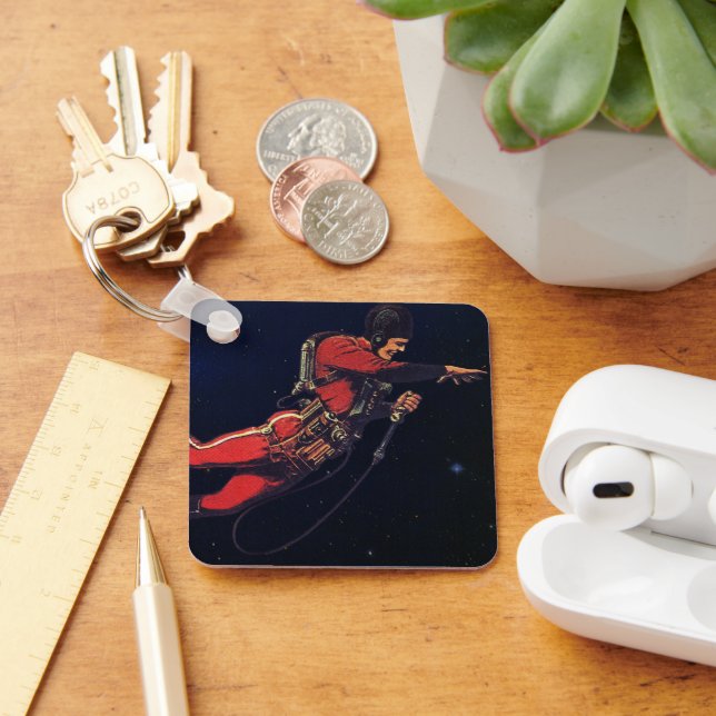 Astronaut der Vintagen Science Fiction im Weltraum Schlüsselanhänger (Schreibtisch)