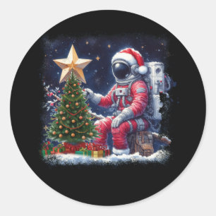 Astronautin in der Nähe des Weihnachtsbaum Weltrau Runder Aufkleber