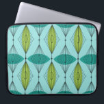 Atomic Ogee & Starbursts Laptop Sleeve<br><div class="desc">Oh, Gee! It's an Atomic Ogee and Starbursts Laptop Sleeve! It's a modern take on classic pattern (a mid century modern take, to be richtig). This design feature an aqua background with teal and green oval shapes overlaying black, vertikale lines of atomic diamonds and starbursts. This mod product brings everything...</div>