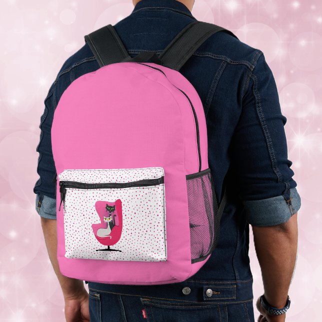 Atomkatzen in rosa Stuhl leuchtend rosa mit Punkte Bedruckter Rucksack (Hot pink back pack with pink dots and two atomic cats in a pink chair on the front pocket.)