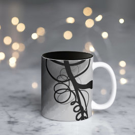 Auf dem Raster: Abstrakt grau, schwarz und weiß Zweifarbige Tasse